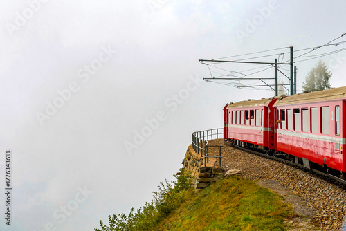 Bernina Express glides from Tirano to St. Moritz, treating passengers to panoramic alpine landscapes and charming villages. Stunning views make this one of the most scenic train journeys in the world