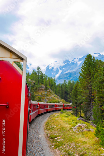Bernina Express glides from Tirano to St. Moritz, treating passengers to panoramic alpine landscapes and charming villages. Stunning views make this one of the most scenic train journeys in the world