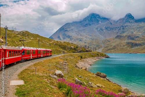 Bernina Express glides from Tirano to St. Moritz, treating passengers to panoramic alpine landscapes and charming villages. Stunning views make this one of the most scenic train journeys in the world