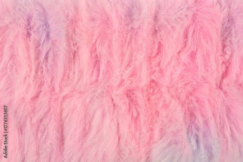 A full frame, overhead shot of a colorful, fluffy, pastel pink and blue faux fur texture