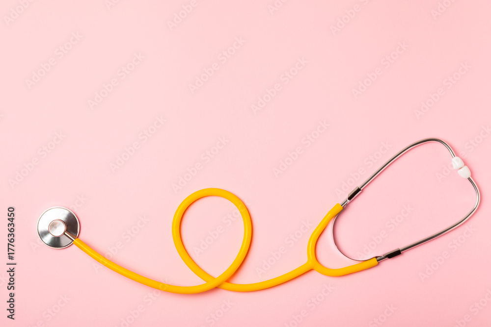 Fototapeta premium Stethoscope on the table. Medical instrument. Medical concept. Healthcare. Health Day.Doctor equipment. Cardiology. Heart disease.Lung diagnostics.Diagnosis of respiratory inflammation.Space for text