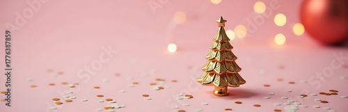 diminutive intricately designed christmas tree ornament shines soft pink background amidst festive confetti twinkling lights