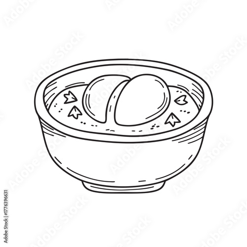 Clay bowl of tomato stew with poached eggs