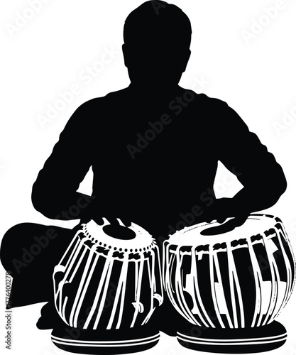 Seated musician playing traditional Indian Tabla drums silhouette vector.