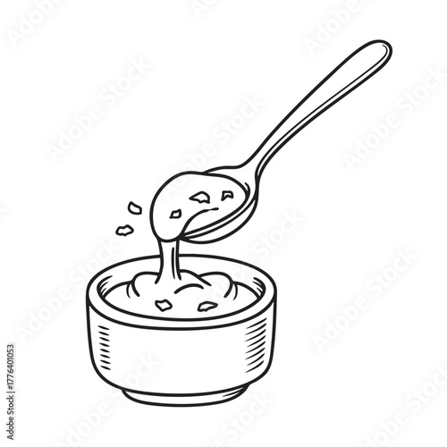 Metal spoon dipping into red spicy paste