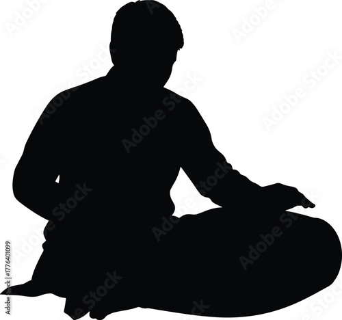 Silhouette of a seated musician playing the Tabla, or similar Indian hand drums.
