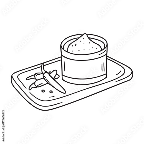 Wooden tray holding garlic paste and chili flakes