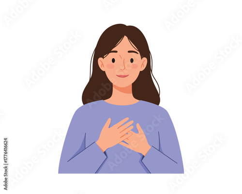 Young woman with brown hair and a gentle smile places hands over her heart expressing gratitude and heartfelt emotion