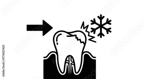 Cracked tooth experiencing sensitivity to cold, indicated by an arrow and snowflake symbol.