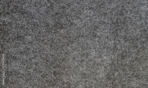 Dark gray felt fabric texture background