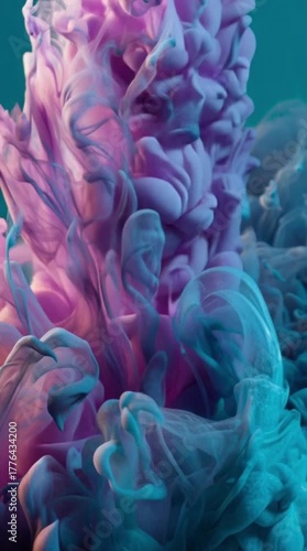 Abstract fluid art showcases vibrant colors of purple and teal, creating a mesmerizing display of ink in water with unique textures.