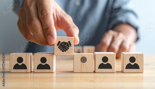 Build your team with partnership and collaboration for success, hand completing the team with a handshake, hiring and recruitment concept for business