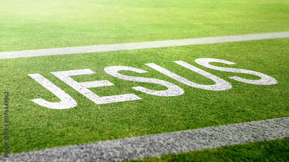 Obraz premium Text of Jesus on green grass texture. Concept of Christianity, religious, faith, Jesus, or belief