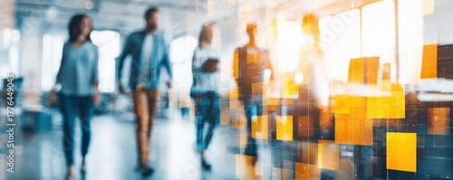 A dynamic office scene with professionals walking, highlighted by a vibrant digital overlay representing innovation and teamwork.
