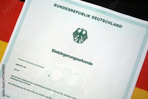 German official naturalization certificate. Symbolic for successful acquisition of German citizenship close up