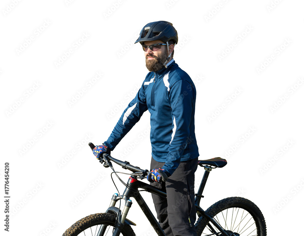 Obraz premium Cyclist in pants and fleece jacket on a modern carbon hardtail bike with an air suspension fork. The guy on the top of the hill rides a bike.