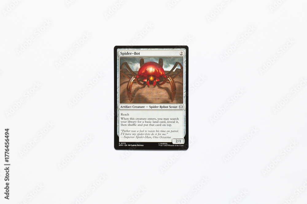 Naklejka premium Bradford, UK Nov 3 2025 Spider-Bot Artifact Creature card from the Spider-man magic the gathering card game shot isolated on a white paper background.