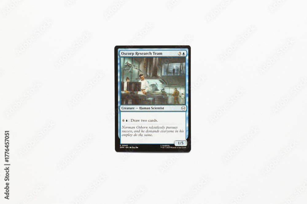 Fototapeta premium Bradford, UK Nov 3 2025 Oscorp Research Team card from the Spider-man magic the gathering card game shot isolated on a white paper background.