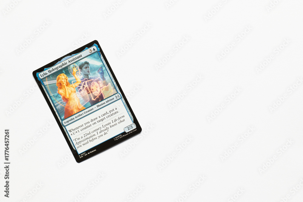 Fototapeta premium Bradford, UK Nov 3 2025 Lyla, Holographic Assistant card from the Spider-man magic the gathering card shot isolated on a white paper background.