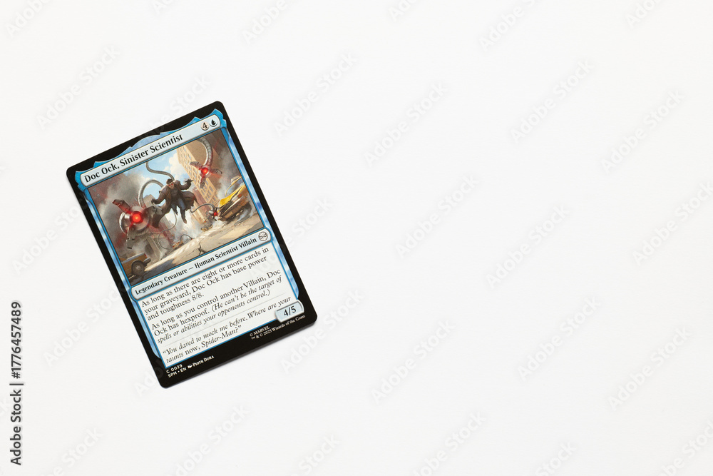 Obraz premium Bradford, UK Nov 3 2025 Doc Ock, Sinister Scientist card from Spider-man magic the gathering card shot isolated on a white paper background.