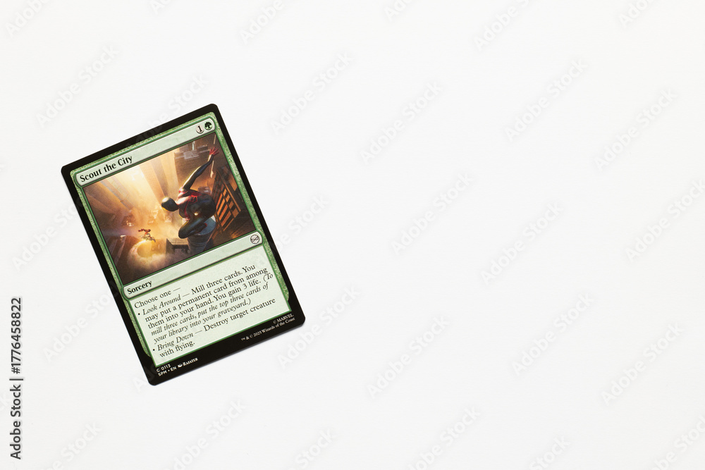 Naklejka premium Bradford, UK Nov 3 2025 Scout the City card from Spider-man magic the gathering card game shot isolated on a white paper background.