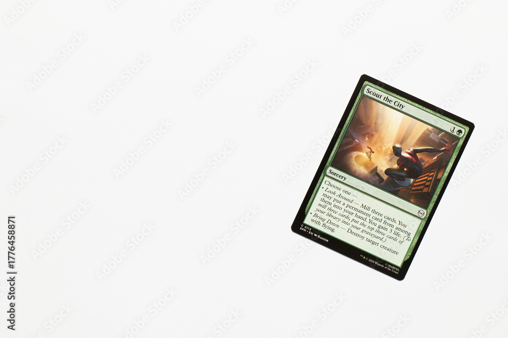 Naklejka premium Bradford, UK Nov 3 2025 Scout the City card from Spider-man magic the gathering card game shot isolated on a white paper background.