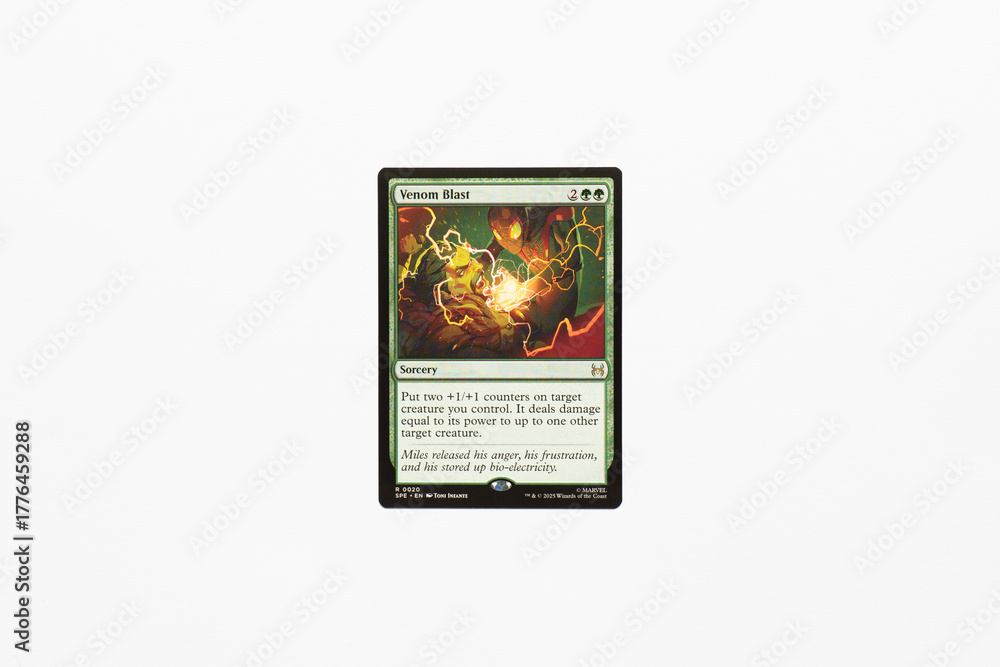 Naklejka premium Bradford, UK Nov 3 2025 Venom Blast card from Spider-man magic the gathering shot isolated on a white paper background.