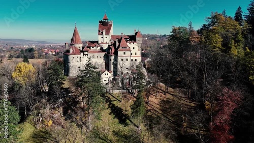 Aerial footage of Bran castle on a sunny autumn day.