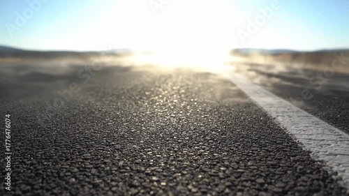Wallpaper Mural Close-up of heat haze rising from a hot asphalt road. Shimmering heat waves distort the view on a sunny summer day. Extreme temperature and travel concept Torontodigital.ca