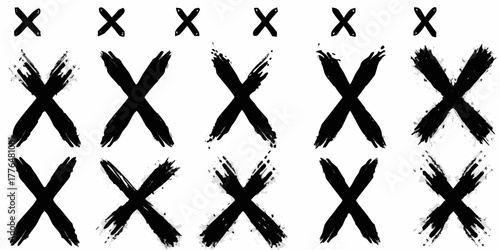 Collection of black cross marks with varying brush stroke textures and sizes on a white background