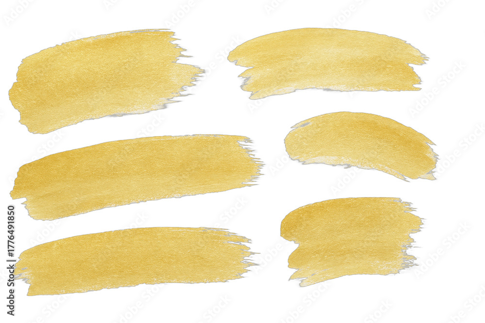 Naklejka premium Golden brush strokes on black background, artistic design elements