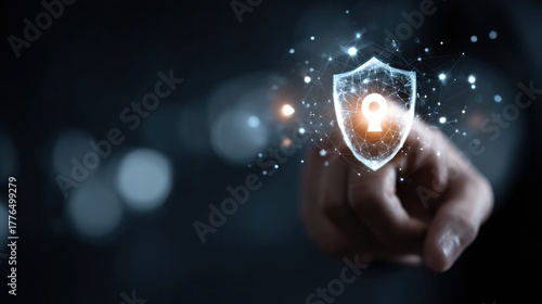 Cybersecurity Shield Protection Concept with Hand Touching Digital Icon.