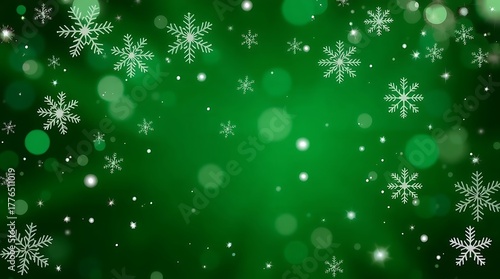 Green christmas background with falling snowflakes and bokeh lights