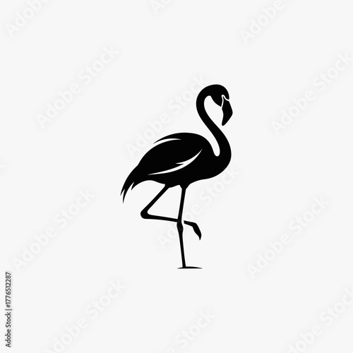 Elegant flamingo silhouette standing gracefully against a plain background.