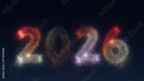 A dazzling firework display illuminates the night sky, forming the year 