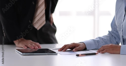 Female health insurance broker presenting his insurance benefits to businessman fill out insurance policy. To prevent future incidents.
