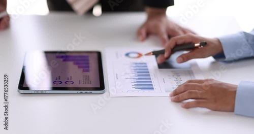 Female health insurance broker presenting his insurance benefits to businessman fill out insurance policy. To prevent future incidents.
