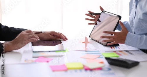 Business man investment consultant analyzing company annual financial report balance sheet statement working with documents graphs. Concept picture of business, market, office, tax.
