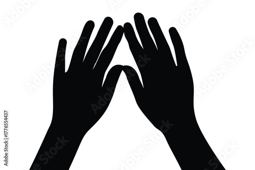 Silhouette of two hands joined in prayer gesture, representing faith, spirituality, and peace.