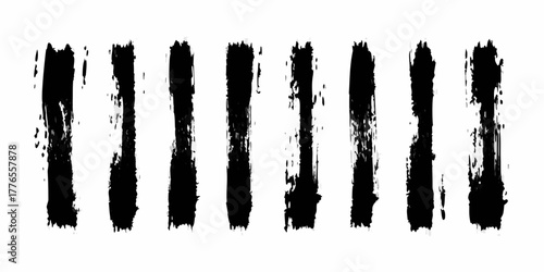 Set of nine abstract black brush stroke vertical lines on a white background