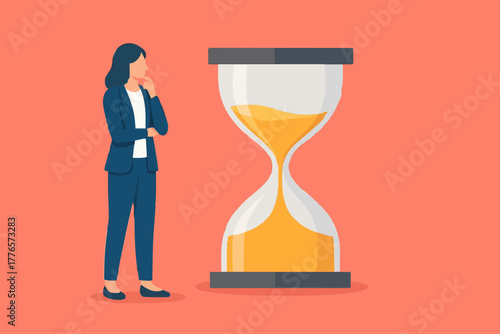 Business time - Bearded businessman standing and looking at hourglass while time goes by. Patience, delay and tolerant concept