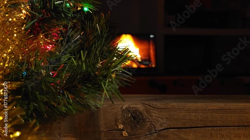 Cozy Christmas Fireplace Scene with Wreath and Tinsel 