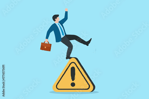 Mistake caution, business risk or problem warning, failure prevention or avoid danger concept, cautious businessman slip falling on exclamation symbol beware, careful caution sign.
