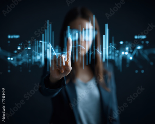 Futuristic businesswoman faceless portrait blazer augmented reality data analytics hologram chart blue glow finance technology focus