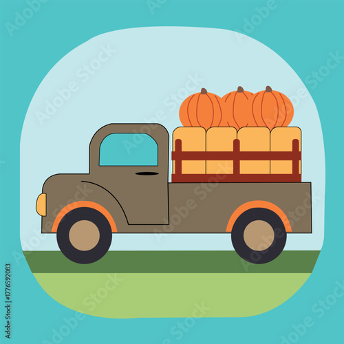 Vintage truck loaded with pumpkins and hay bales