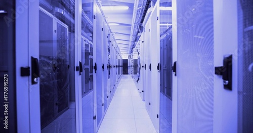 Featuring tiled aisle running along data center corridor, with server racks and cable trays