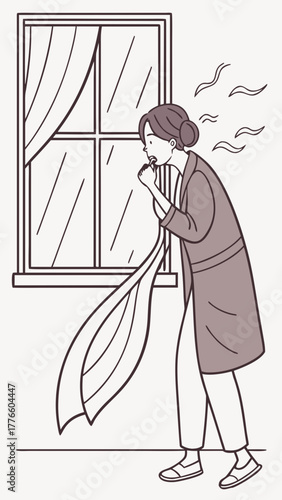 Woman coughing while standing near a window in her home  