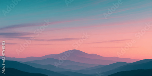 Stunning mountain landscape at sunset with a misty valley and a vibrant sky