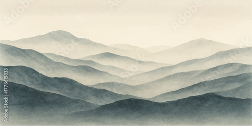 Misty mountain landscape with clouds and sky at sunrise