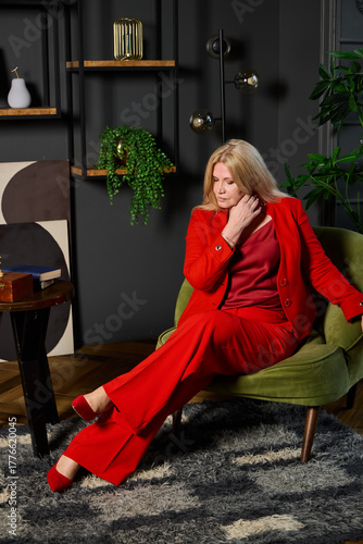business strategist in modern setting, professional in stylish lounge with thoughtful pose